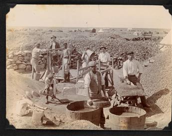 (DE BEERS MINING OPERATION, SOUTH AFRICA) Album containing 21 photographs of diamond mining and trading operations in South Africa.